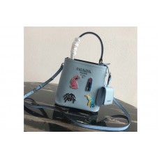 Prada Small Prada Panier bag with appliqués in Light Blue Saffiano leather Prada Small Prada Panier bag with appliqués in Light Blue Saffiano leather