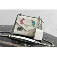 Prada Saffiano Leather Prada Monochrome Bag with appliqués in White Saffiano leather Prada Saffiano Leather Prada Monochrome Bag with appliqués in White Saffiano leather