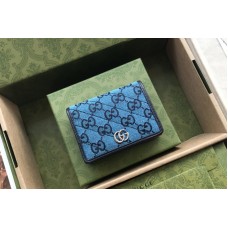 Gucci GG Marmont Multicolor case wallet in Light blue and blue diagonal matelassé GG canvas Gucci GG Marmont Multicolor case wallet in Light blue and blue diagonal matelassé GG canvas