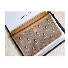 Gucci Disney x Gucci pouch in Beige/ebony mini GG Supreme canvas Gucci Disney x Gucci pouch in Beige/ebony mini GG Supreme canvas