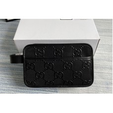 Gucci GG embossed cosmetic case in Black GG embossed leather