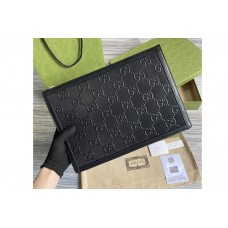 Gucci GG embossed pouch in Black GG embossed leather