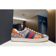 Gucci Men’s Disney x Gucci Donald Duck Ace sneaker in Beige and ebony GG Supreme canvas