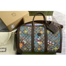 Gucci Disney x Gucci Donald Duck duffle bag in Beige and ebony GG Supreme canvas with Donald Duck print Gucci Disney x Gucci Donald Duck duffle bag in Beige and ebony GG Supreme canvas with Donald Duck print
