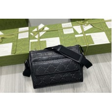 Gucci GG embossed messenger bag in Black GG embossed leather