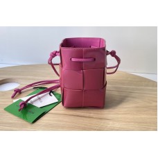 Bottega Veneta Cassette Mini intreccio leather cross-body bucket bag in Azalea Leather