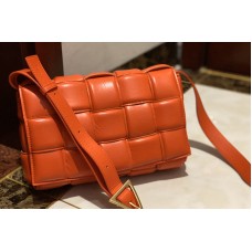 Bottega Veneta padded cassette bag in Orange Lambskin Leather