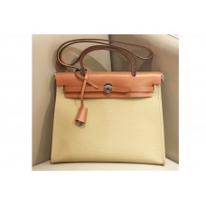 Hermes herbag zip in Brown/Yellow Officier canvas and Leather Hermes herbag zip in Brown/Yellow Officier canvas and Leather