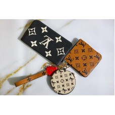 Louis Vuitton M69516 Crafty Trio Pouch in Caramel / Cream / Black Monogram Empreinte leather